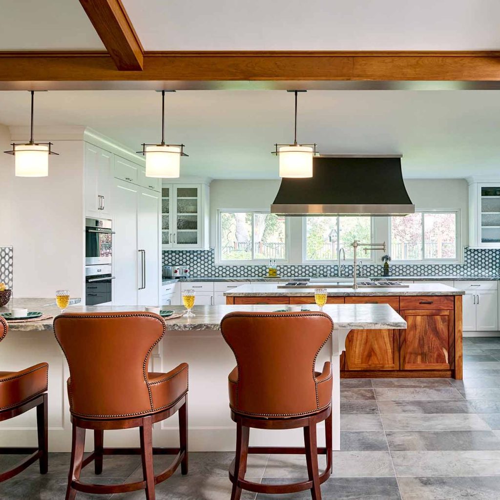 Cynthia Bennett & Associates designs cohesive outdoor living spaces that blend with home architecture, enhancing flow, comfort, and function for year-round enjoyment and seamless summer hosting.